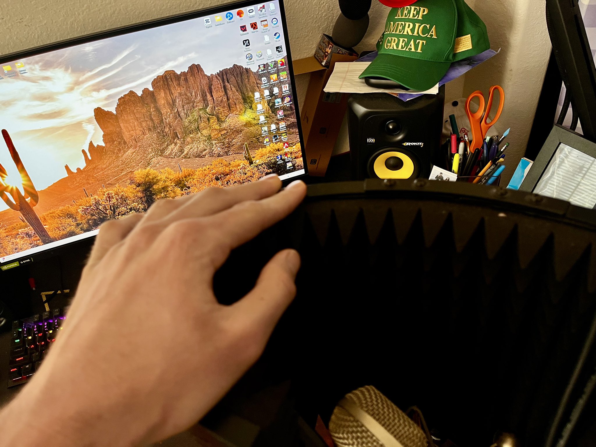 Daegan's recording desk with a Sonoran desert desktop wallpaper